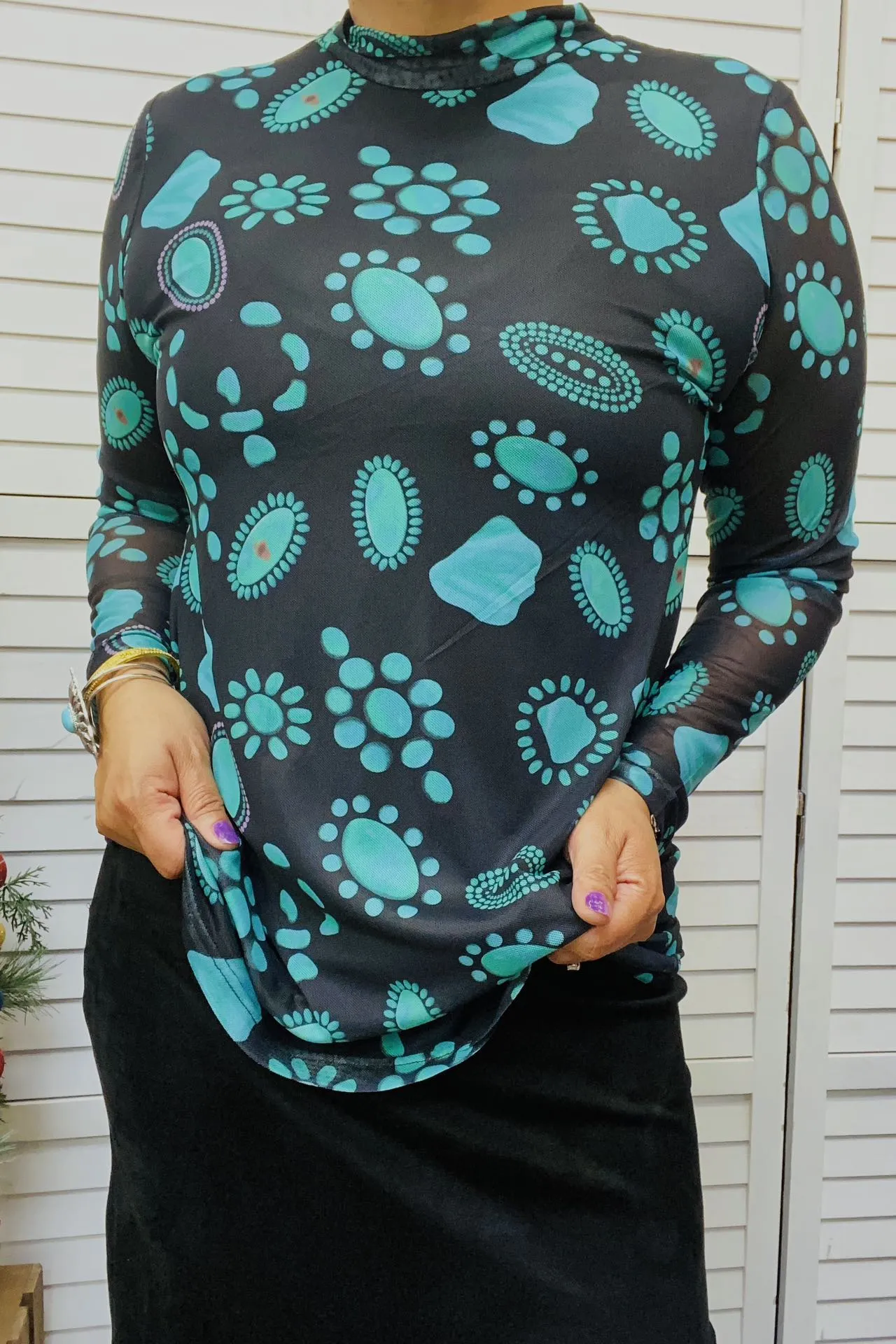 3X only.Black Top with Turquoise concho print and sheer long sleeves